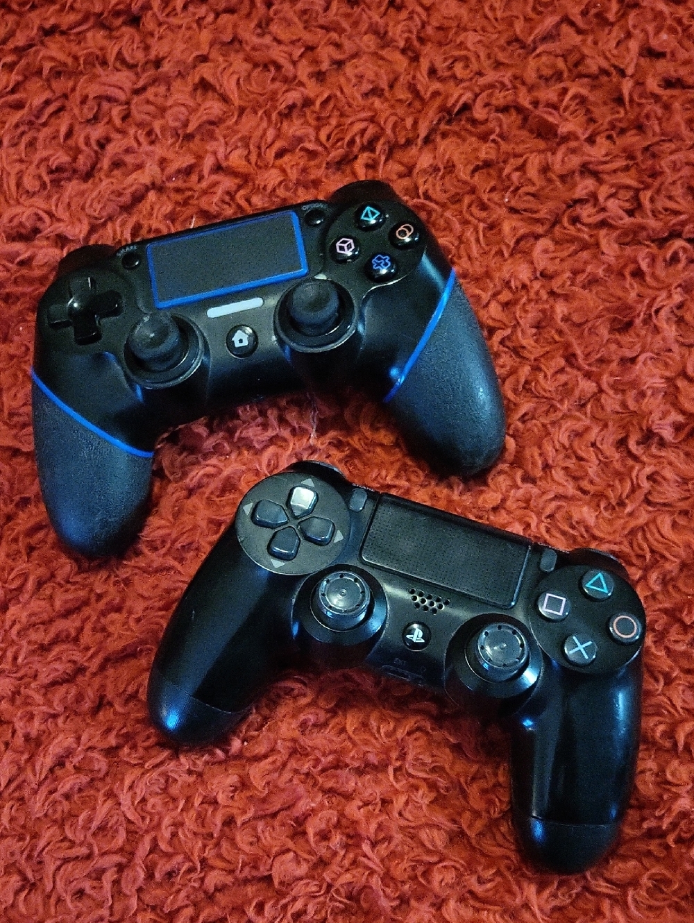 Sony Black Wireless Game Controllers with Blue Trim